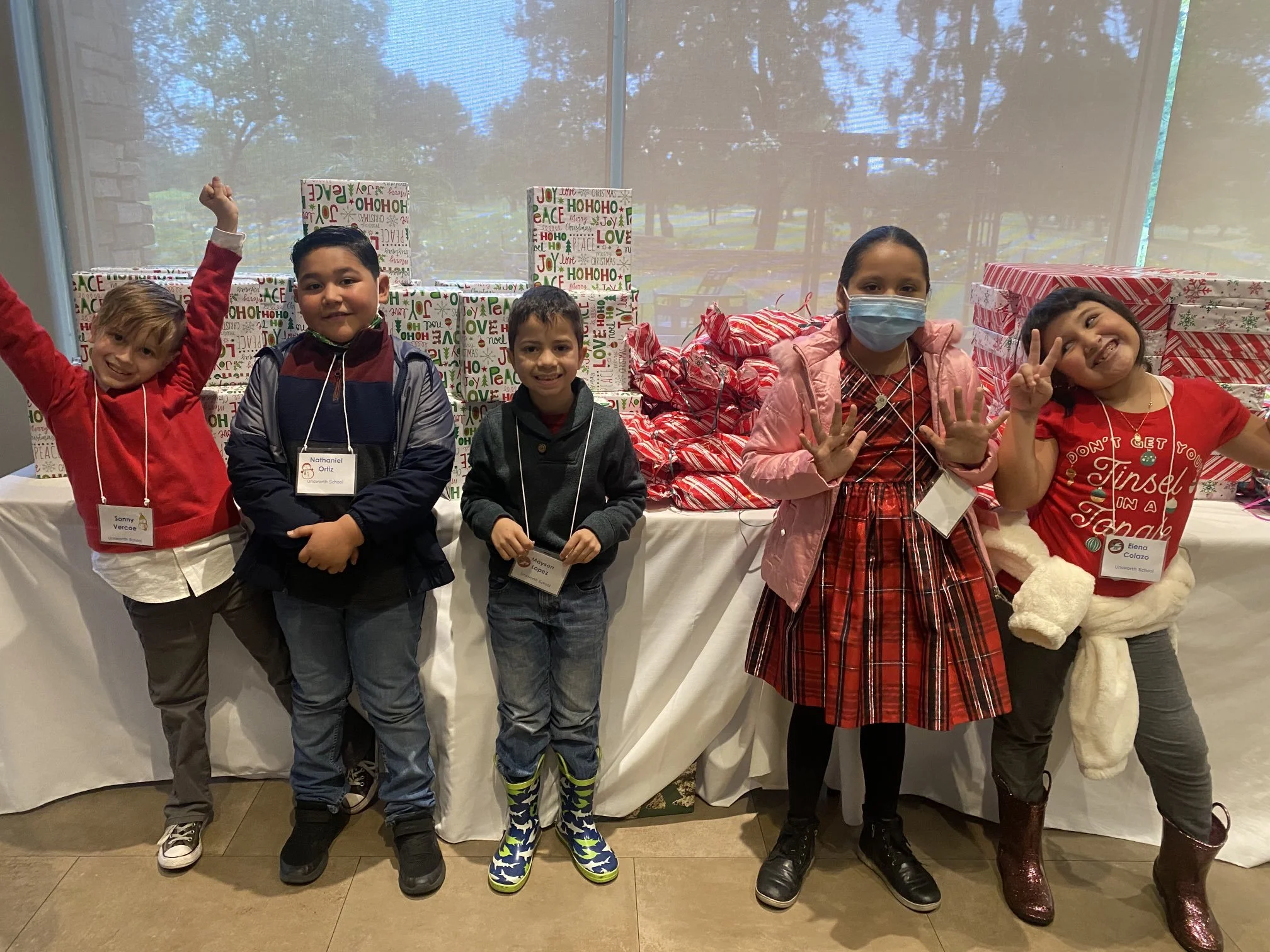 Even the biggest storm of the year can’t  keep Santa away from these kids