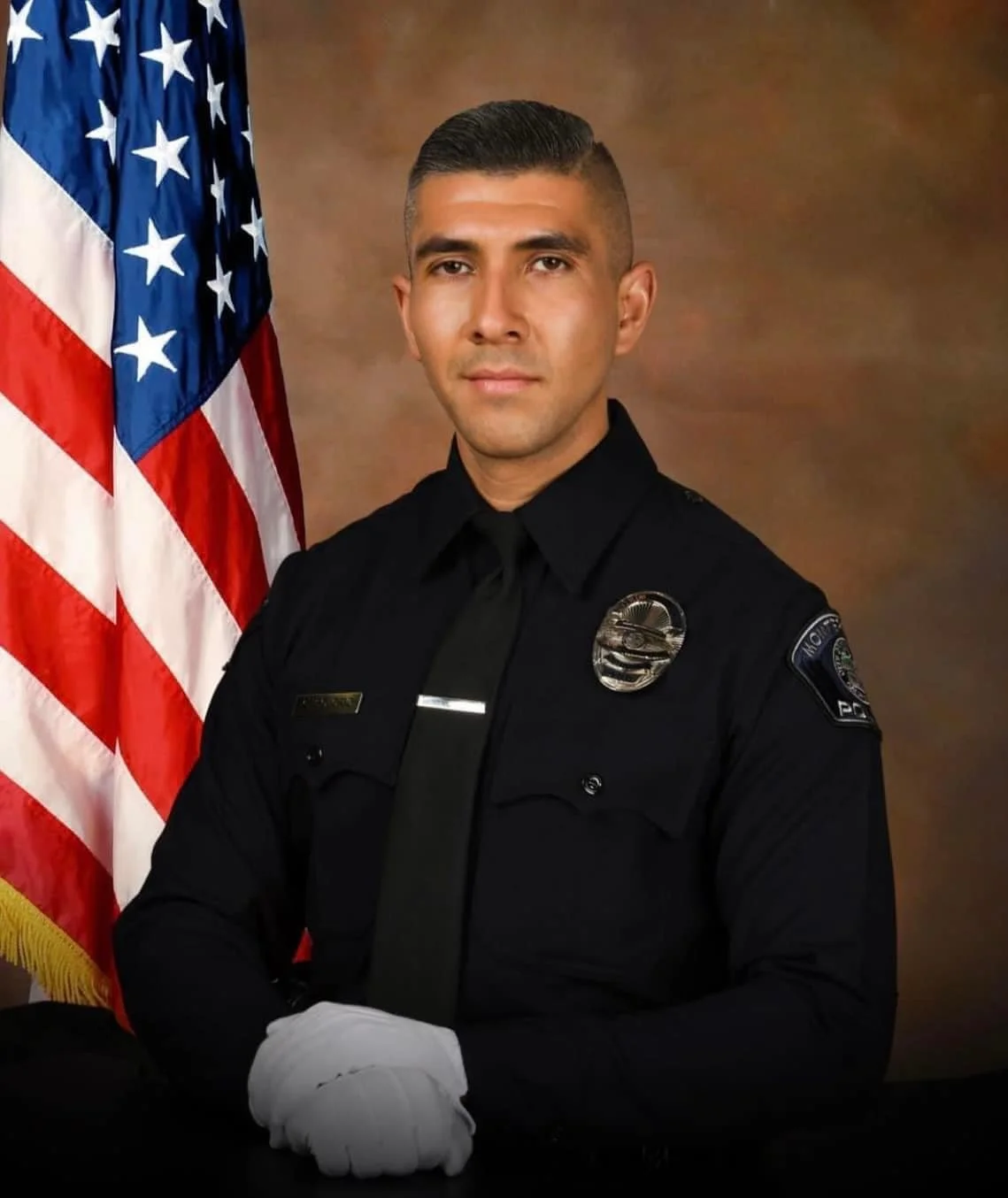 Arrests made in killing of off-duty Monterey Park officer.