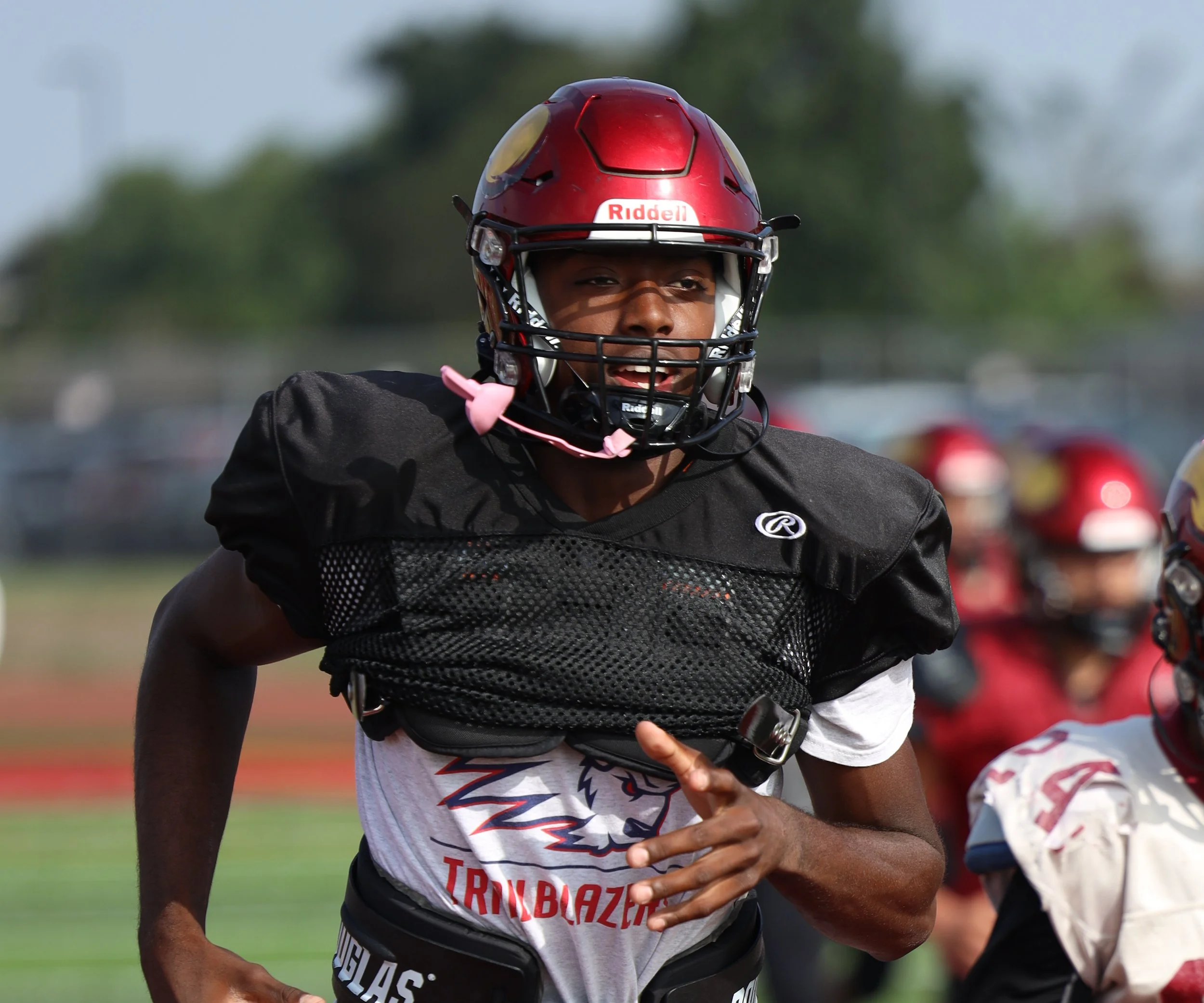 Downey, Warren look to compete for football title