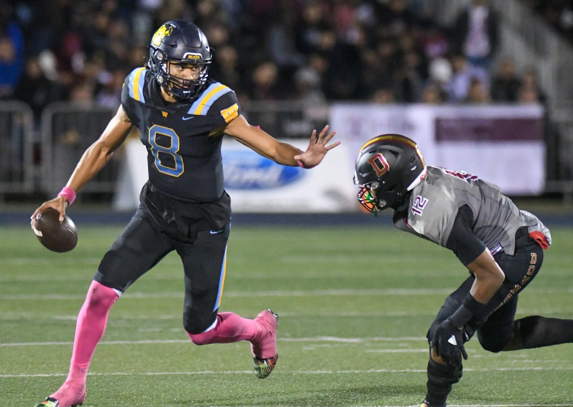Warren tops rival Downey  in QB showdown