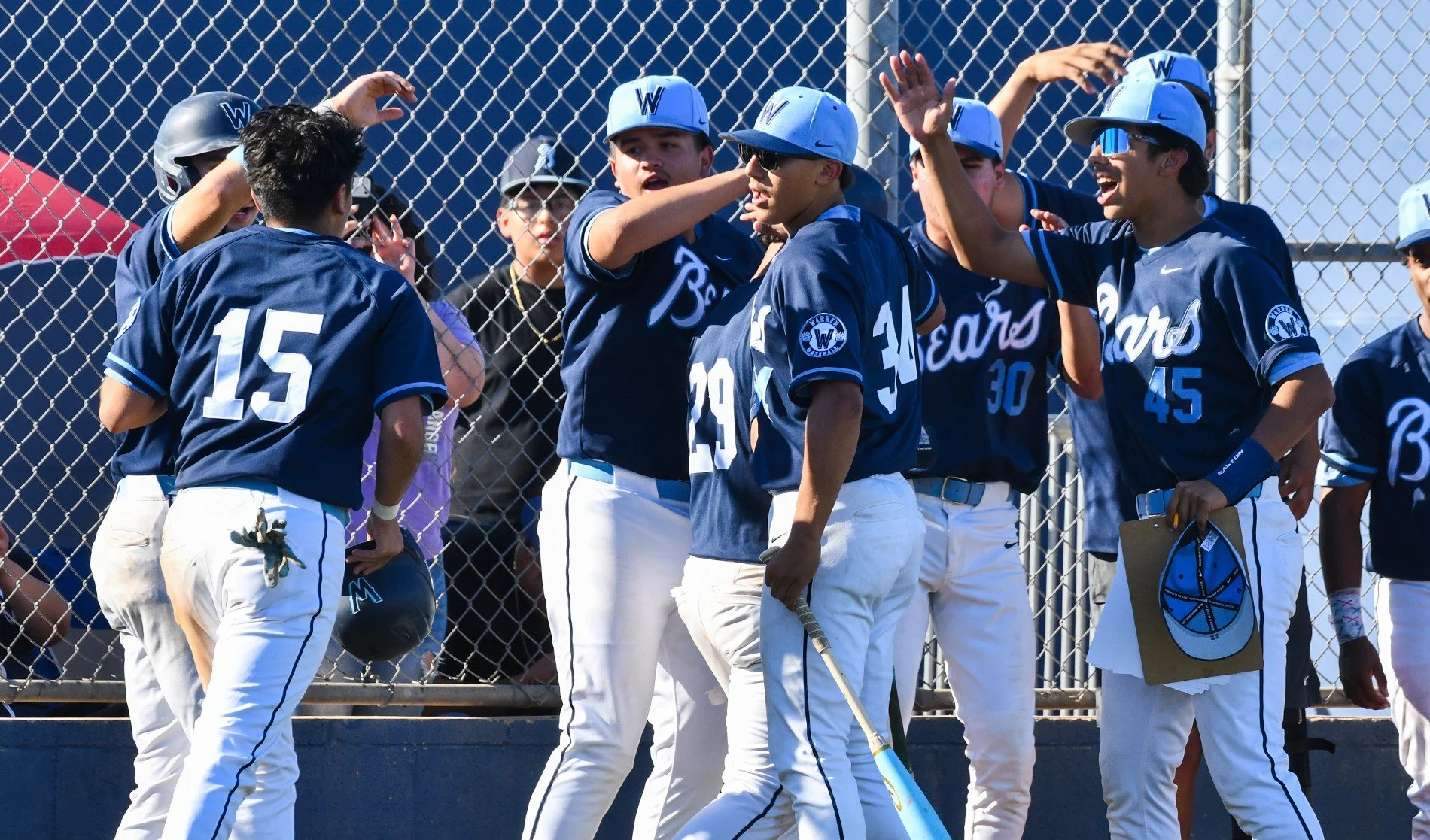 Warren rallies past Downey in rivalry showdown