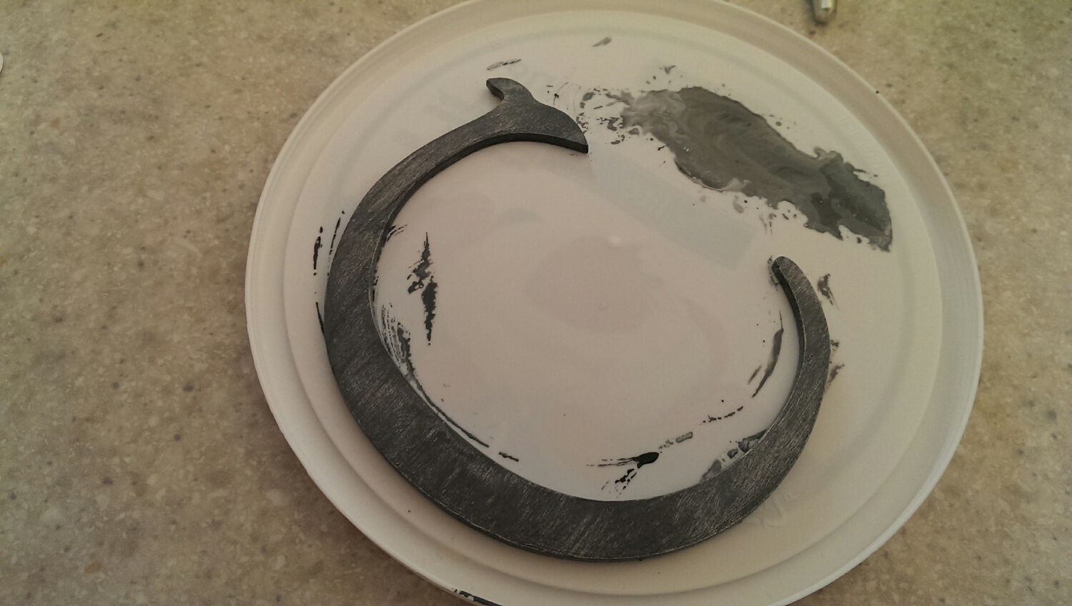 The monogram paint dries