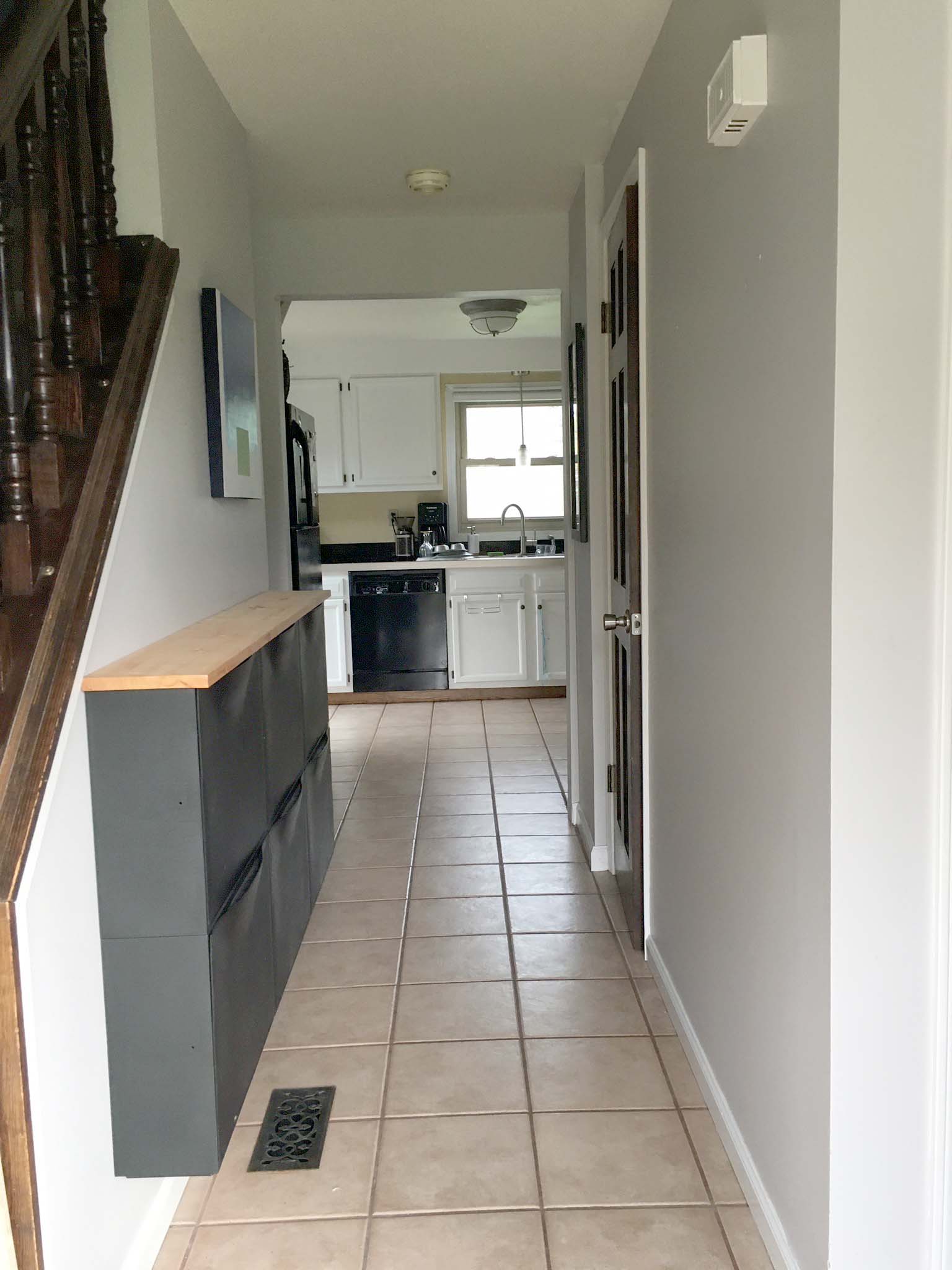 striped wall // black and white stripes // entryway