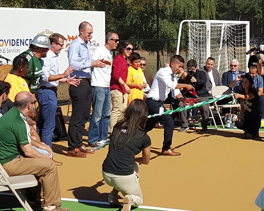 Ricki Ruiz of the Rockwood Initiative cuts the ribbon to open SNAKE Court.