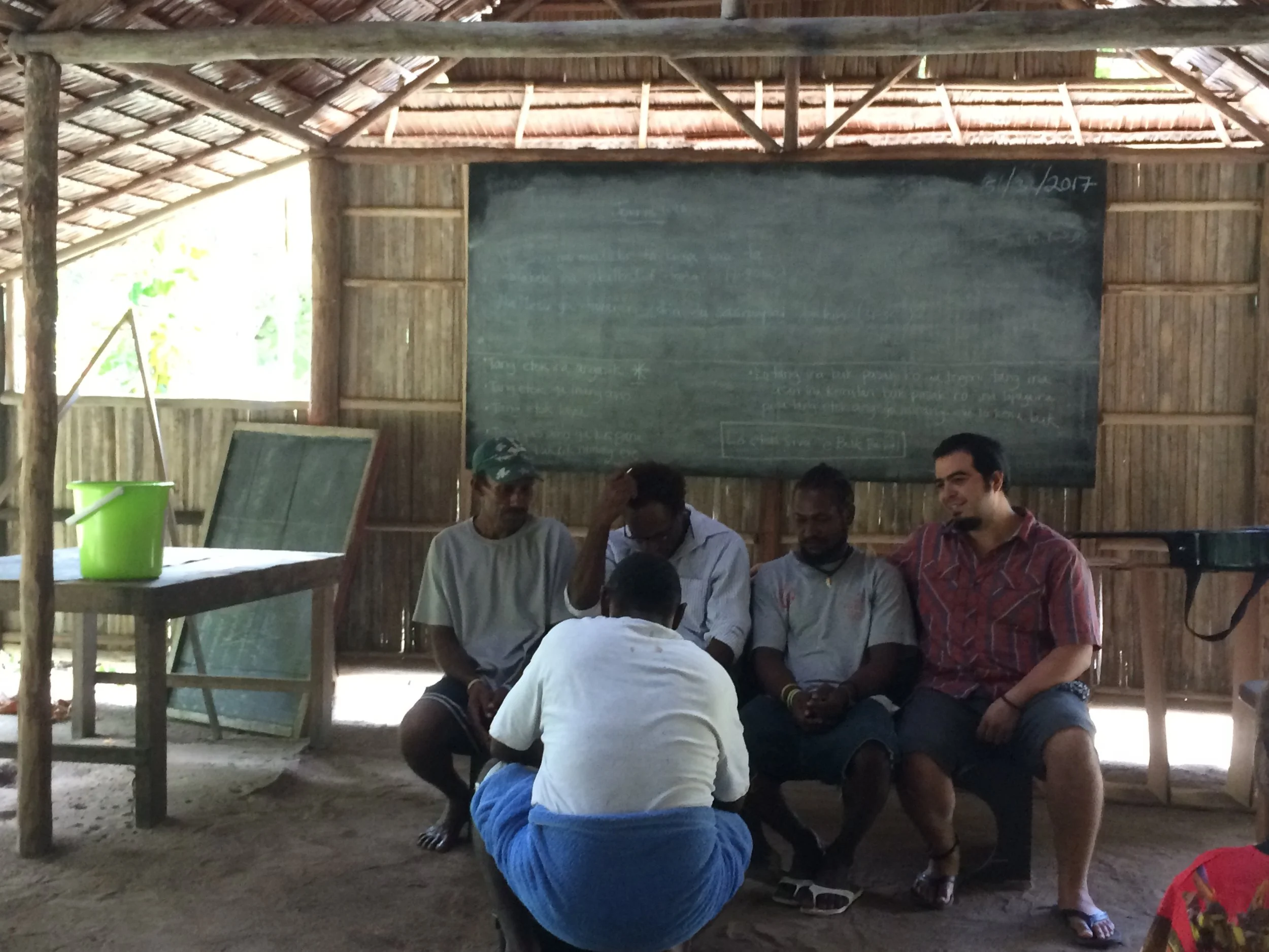 Some of the believers doing a short drama of Jesus washing the disciples' feet in John 13
