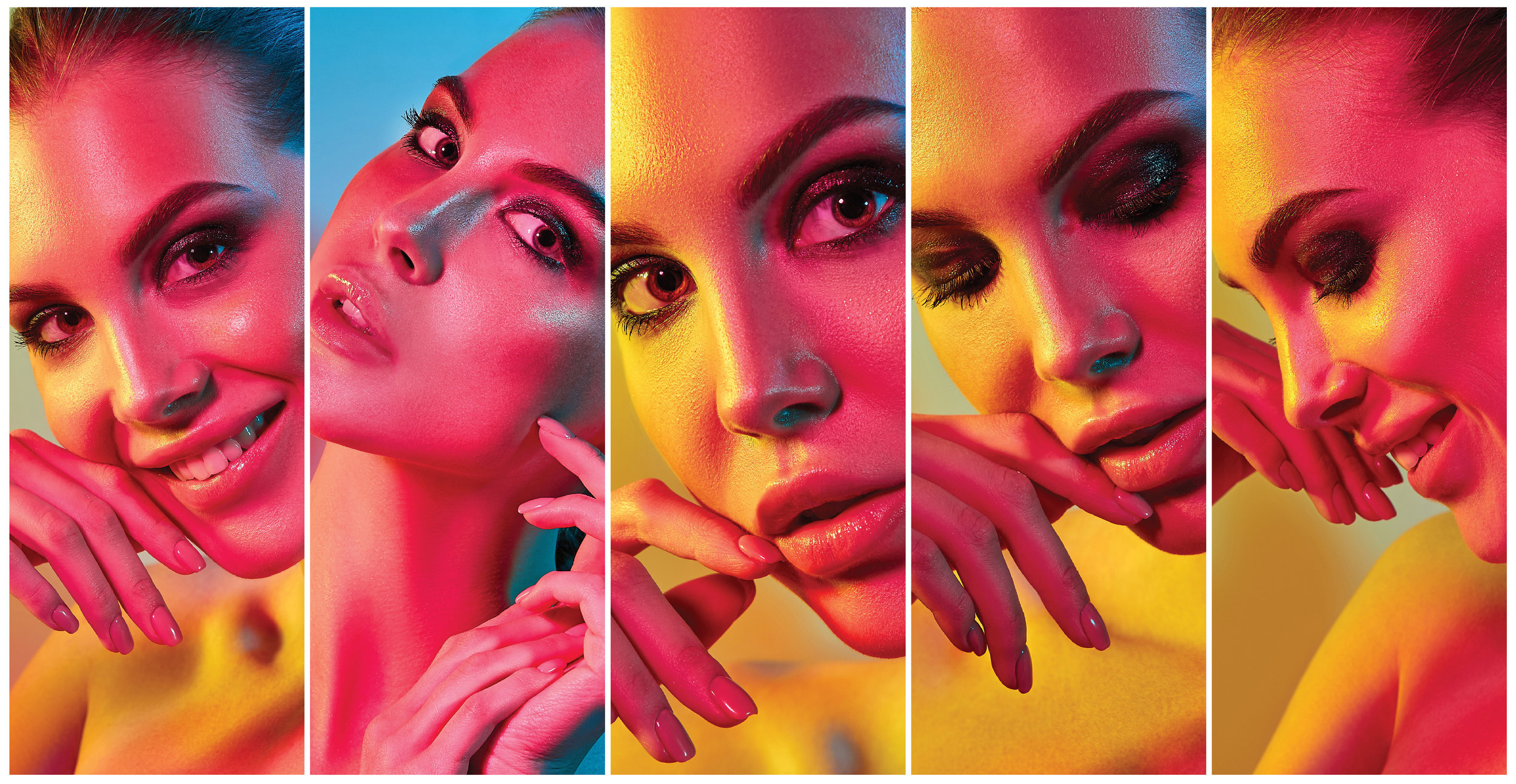 High Fashion model woman in colorful bright lights posing in studio