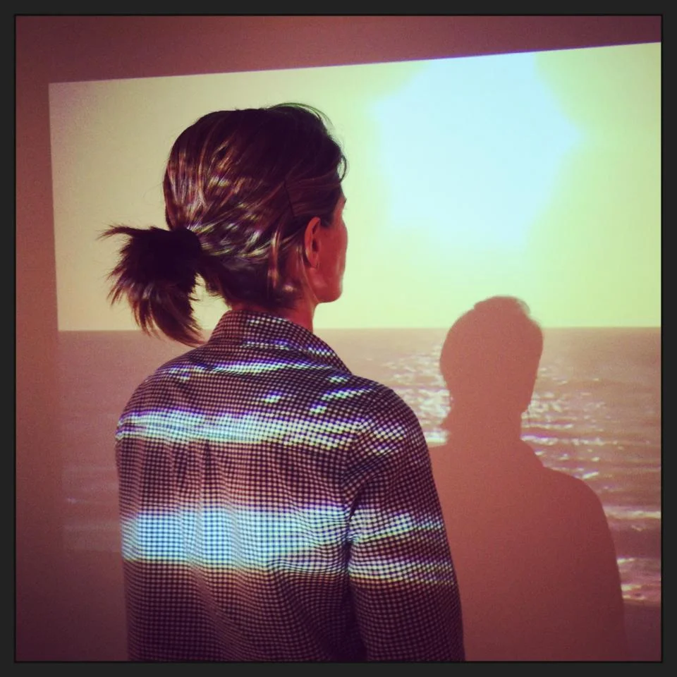 A colleague, a dark blue gingham shirt, a sunset.