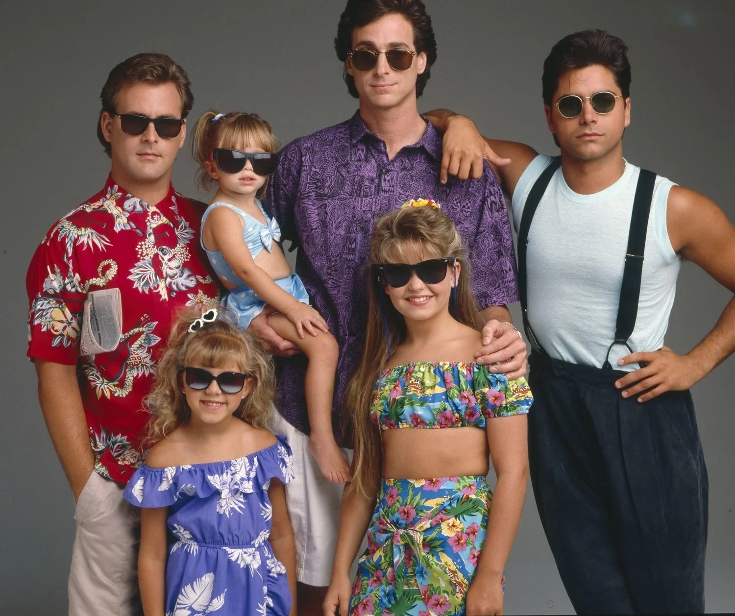 DJ Tanner in off-the-shoulder crop top and coordinating skort on Full House.