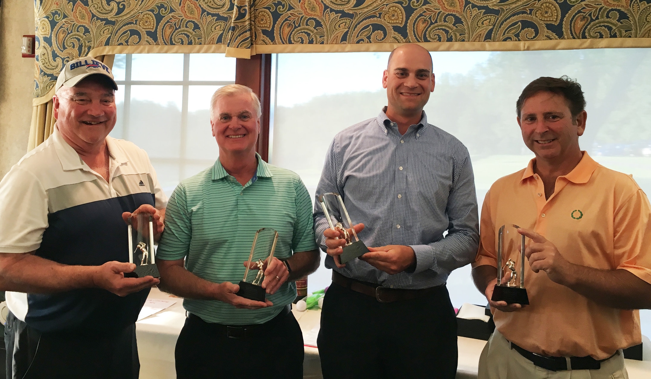 Bivona Golf Tournament Co-Chairs Andy McDermott and Mark Verdi presented awards to the Bivona Corporate Golf Challenge Champion team from Campus Construction Management Group. From left to right: Andy McDermott, Thomas Sexton (President, Campus Construction Management), Mark Esposito (VP, Campus Construction Management), and Mark Verdi