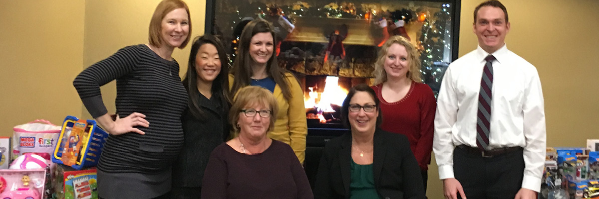 Members of the Monroe County District Attorney's Office team pose for a photo during Bivona's annual holiday luncheon.