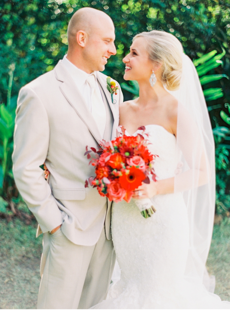 Bride and Groom with Holiday Florals