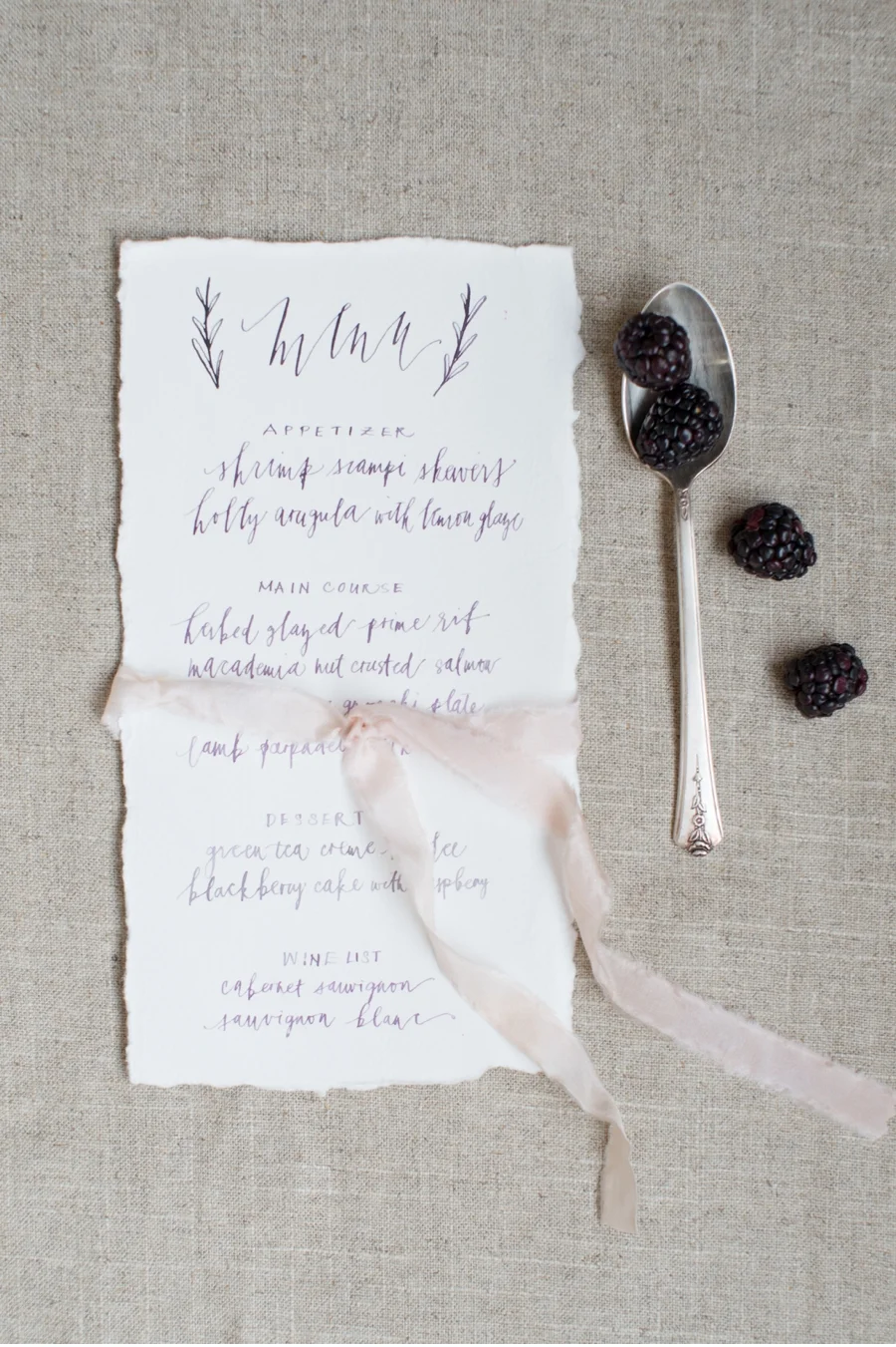 16. A berry-inspired shoot and with calligraphy by Written Word Calligraphy and photos by Christie Graham Photography . Check out the full shoot here .