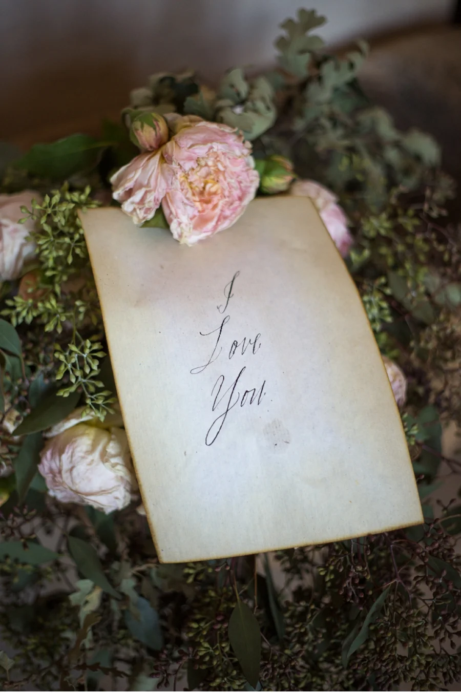 19. Three simple words on parchment style paper say it all. From Elizabeth Messina's A Lovely Workshop with calligraphy by Maybelle Imasa-Stukuls and photography by Maru Photography . 