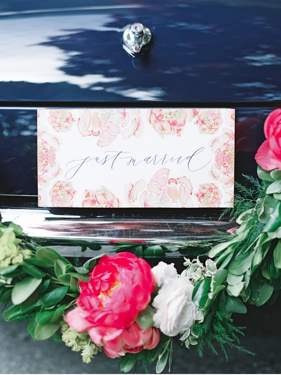 20. No ostentatious flash here, just sweetness and class for the back of this vintage getaway car.  Crafted by Written Word Calligraphy and photography by Christie Graham Photography.  View the entire post here.