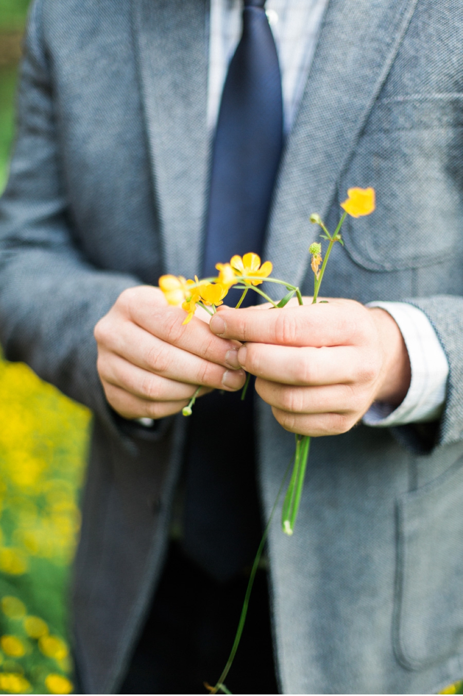 Groom-with-yellow-wildflowers