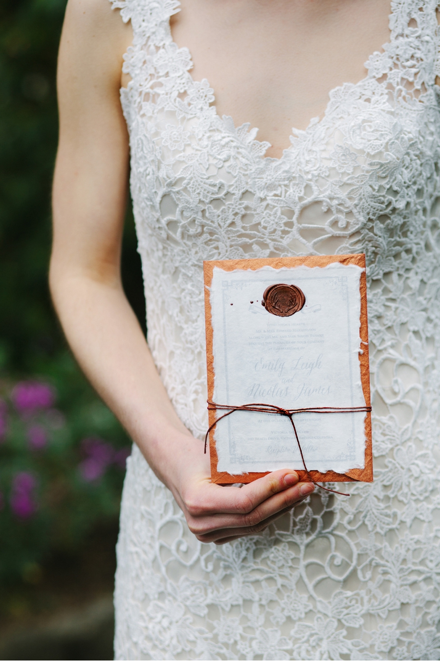 Bride-with-Handmade-Wedding-Invitation