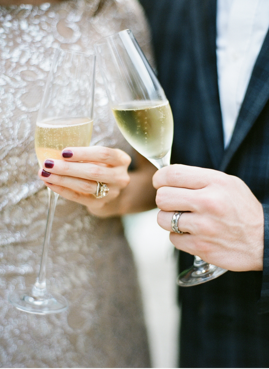 Bride-and-Groom-with-Champagne-and-Rings