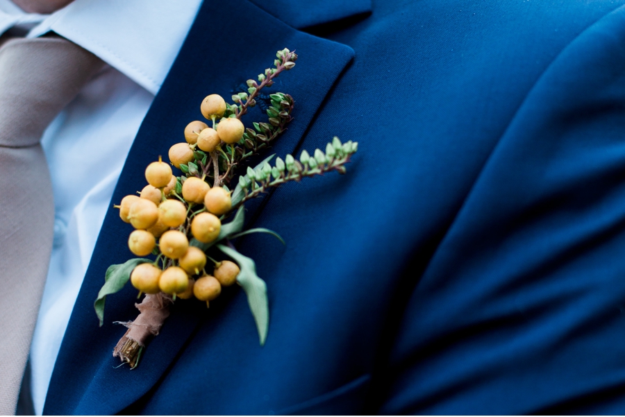 Blue-Suit-with-Yellow-Berry-Boutonierre