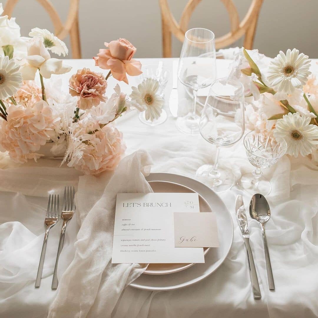 It doesn't take a detective to figure out that we're big fans of brunch. In fact, we're predicting that daytime weddings will be making a big comeback in 2021. How could you resist with an adorable tablescape like this? 

Photographer: @agatharowland