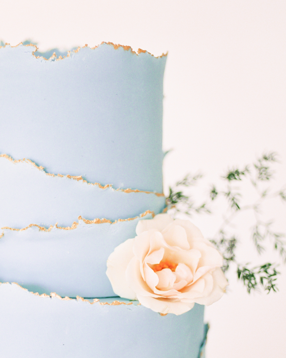 Blue Wedding Cake with gold edges