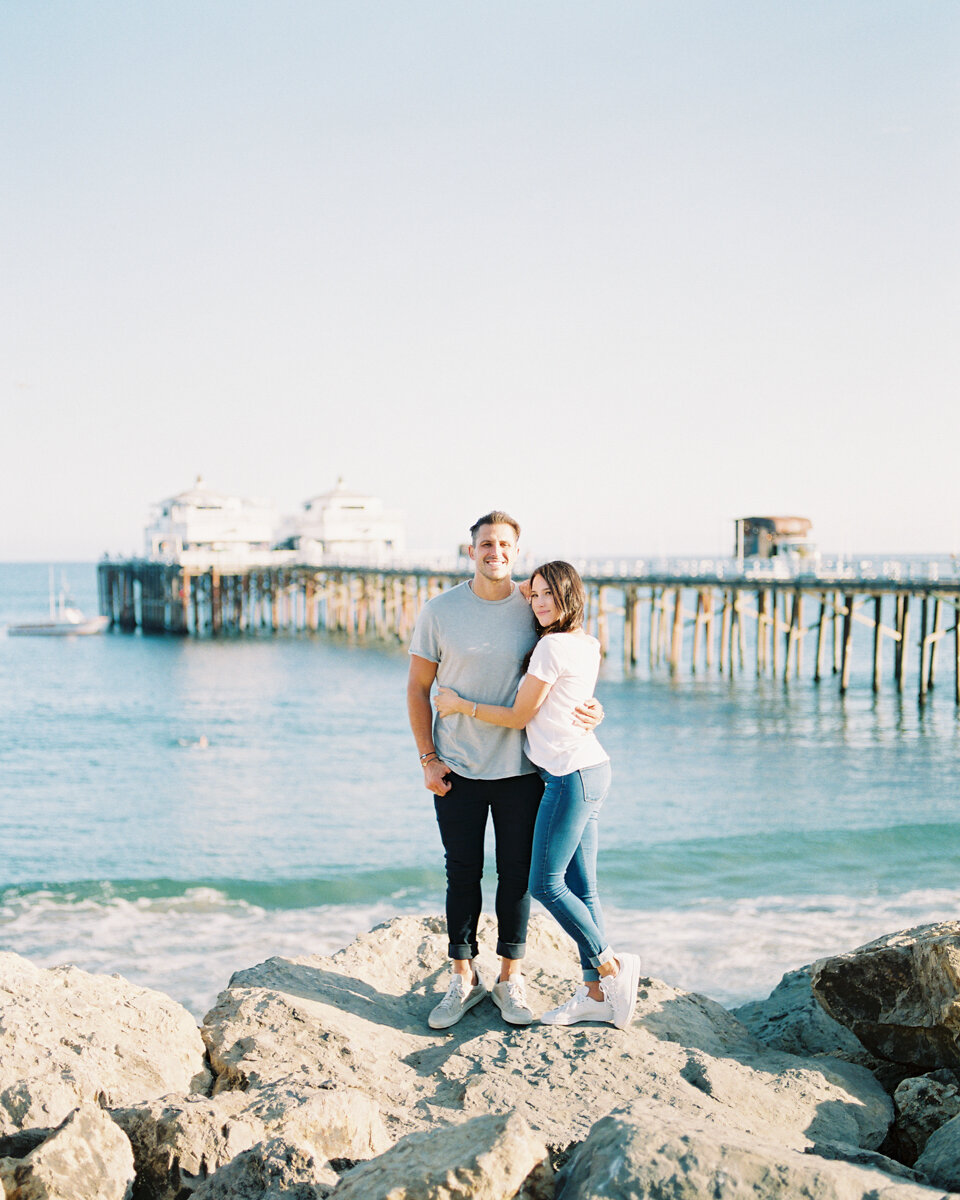 Light and airy lifestyle beach engagement photo