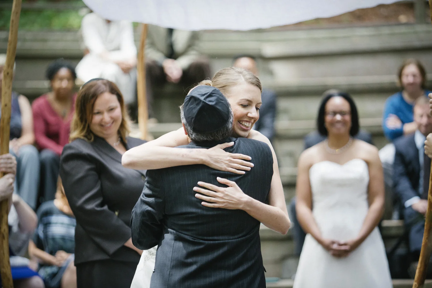 Rachel hugging her father during her wedding. 