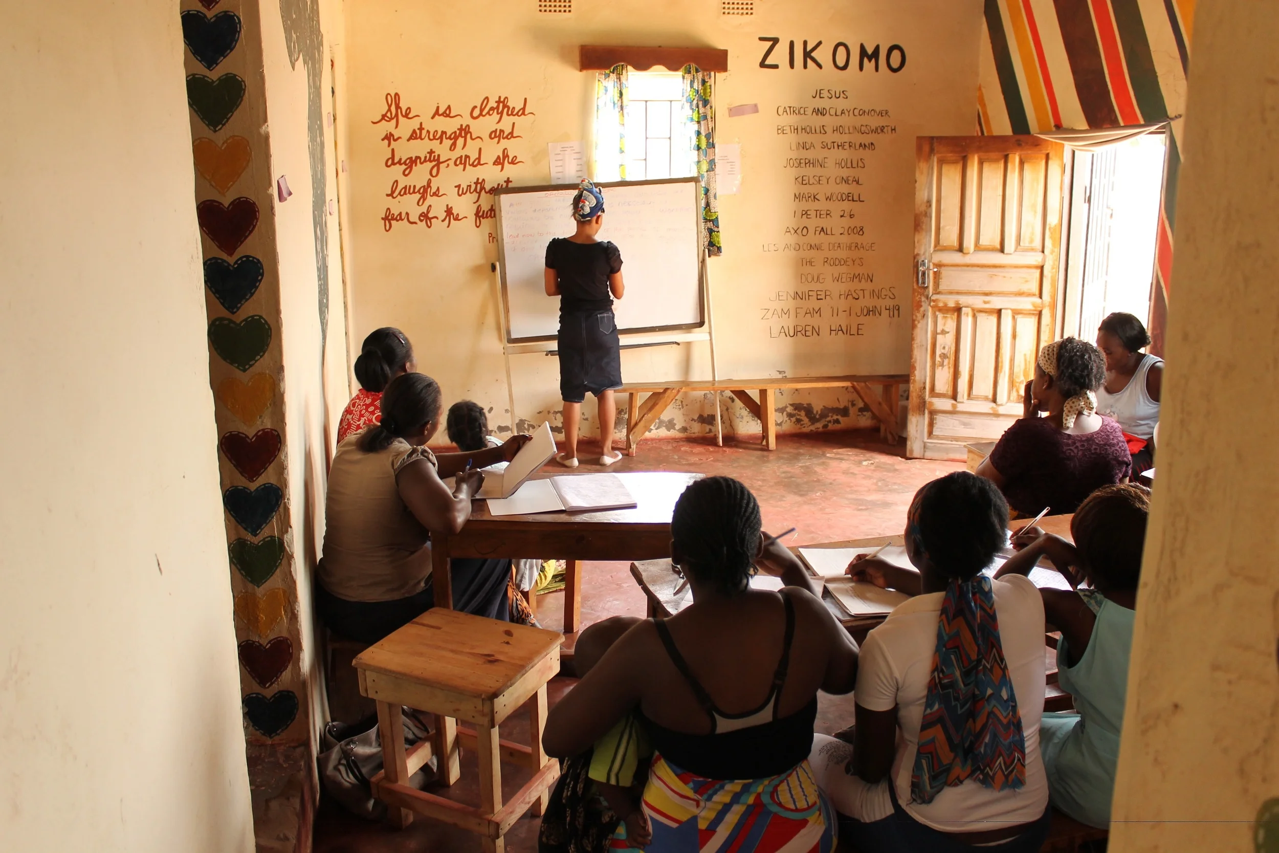 At 2pm (or 14 hours as we say), the next group of students arrive for their 2-hour class. Students take notes from Instructor Tresa. Those who can't read or write learn from oral instruction accompanying this lesson.