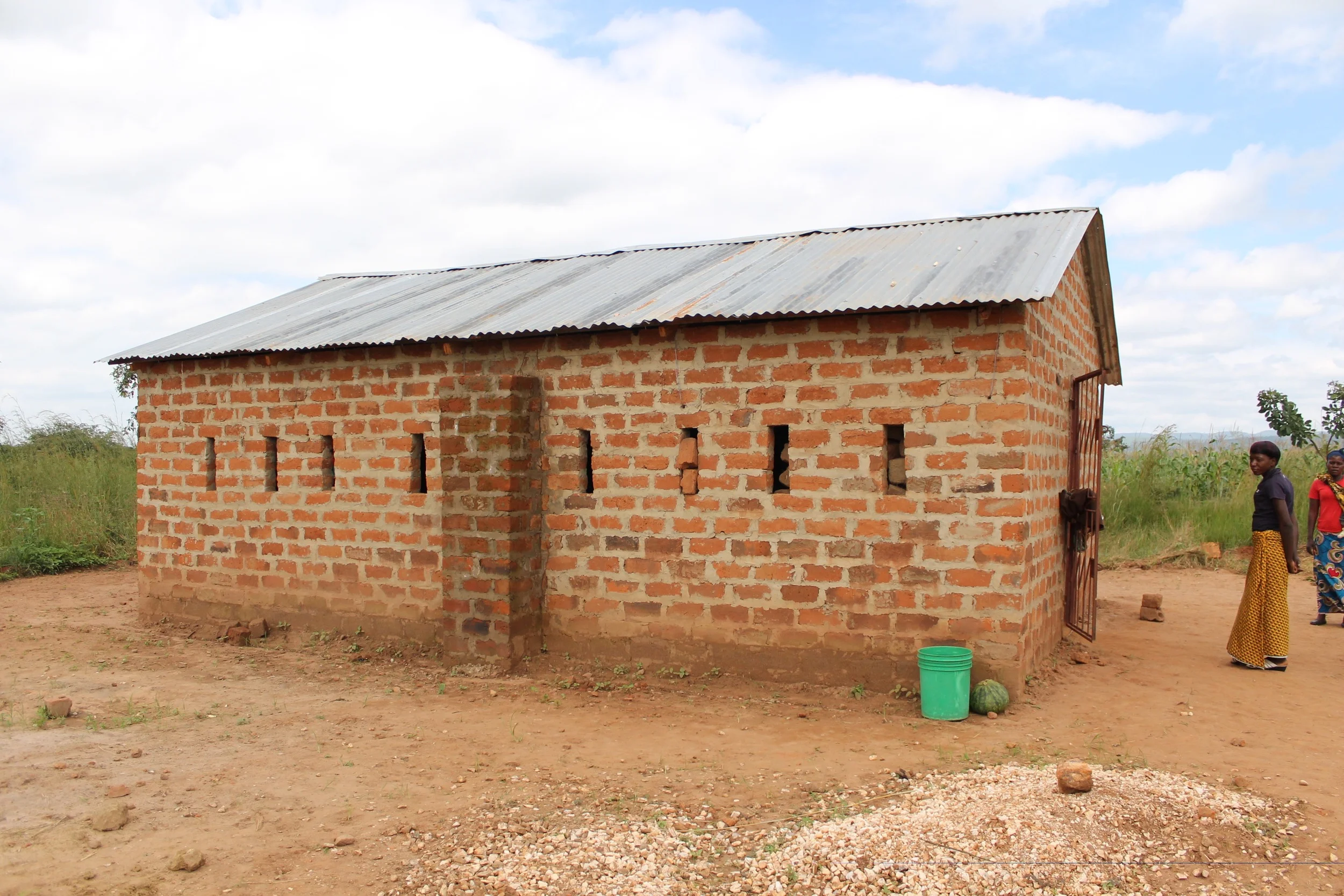Three hours later, we pulled up to this BEAUTIFUL new Chikondi Community Center in Muchochoma Village, made possible by our amazing supporters/donors.
