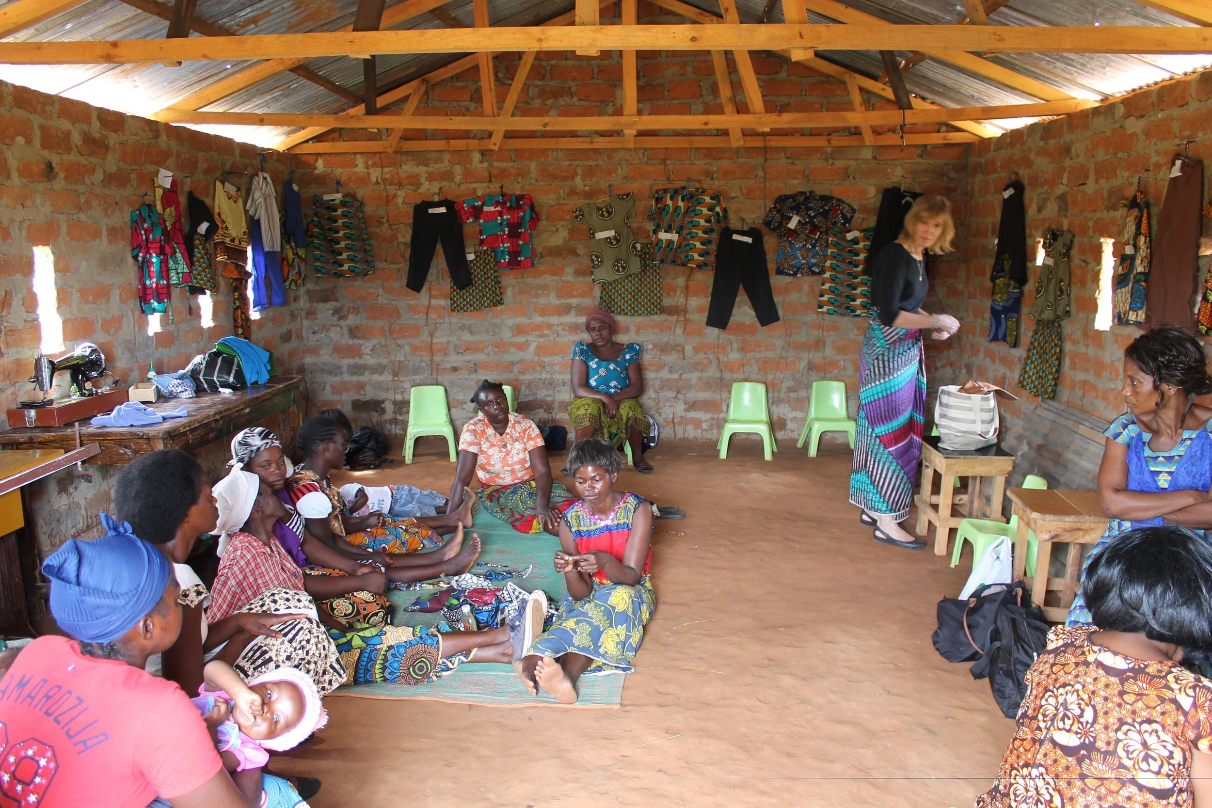 Inside, Lusaka ladies mingled with Village ladies, and we all admired the graduation test pieces adorning the walls. 