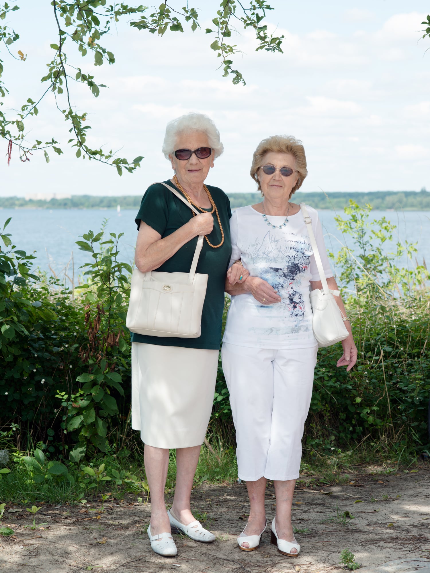  Eleanore and Erika  Eleanore and Erika are visiting lake "Senftenberger See". They live in the city Senftenberg, which is bordering the lake and they remember how different it used to look here. According to them people from Senftenberg are very pro