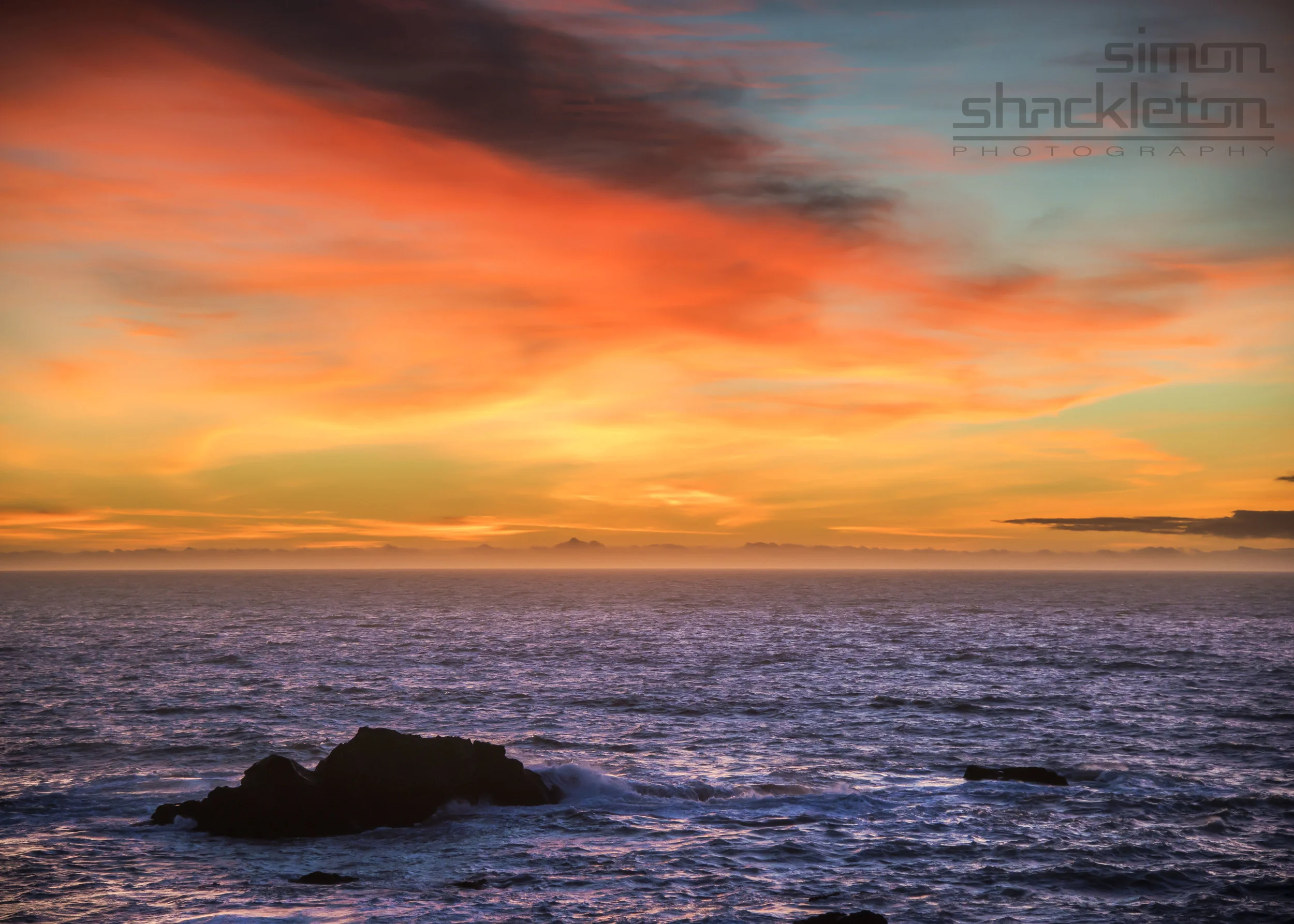 Sunset on Highway One.