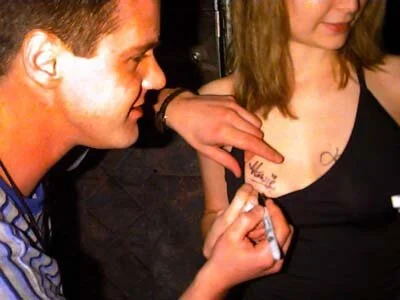 Howie signing boob 2.jpg