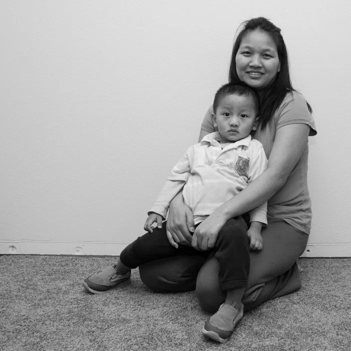 resettled refugees from Myanmar in their home in Portland, OR