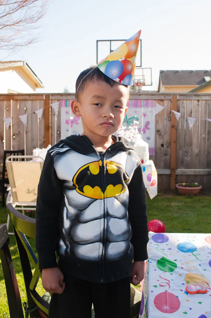 Batman, with party hat