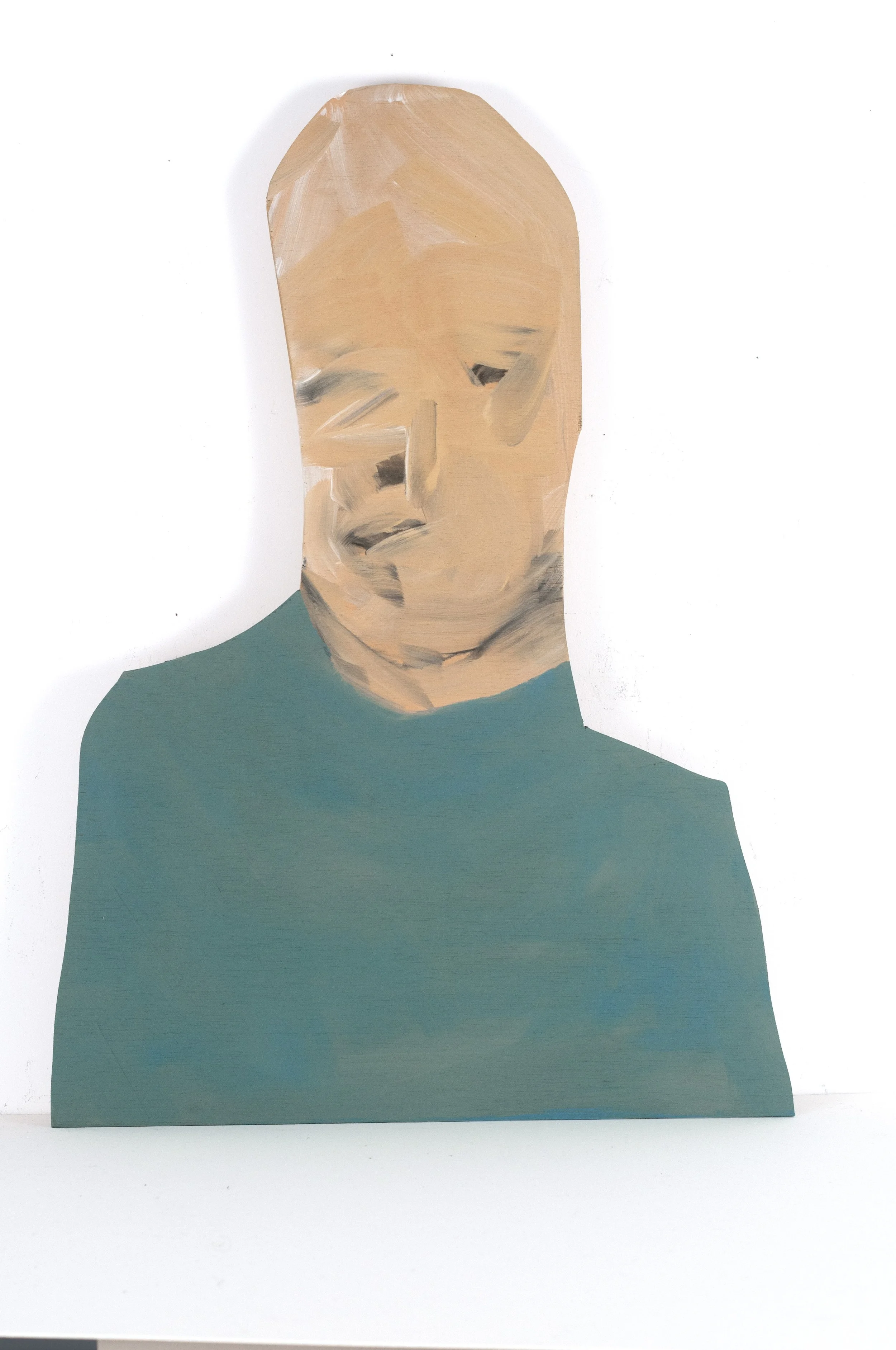 DSC4768 Wall hang guy with blue shirt blurry face.jpg