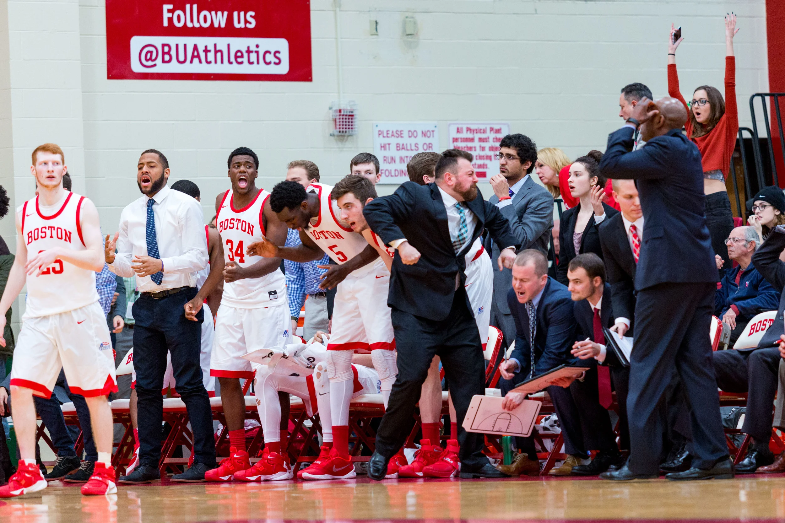 Boston University's bench can't believe they turned the ball over at the end of a tight game with Bucknell.