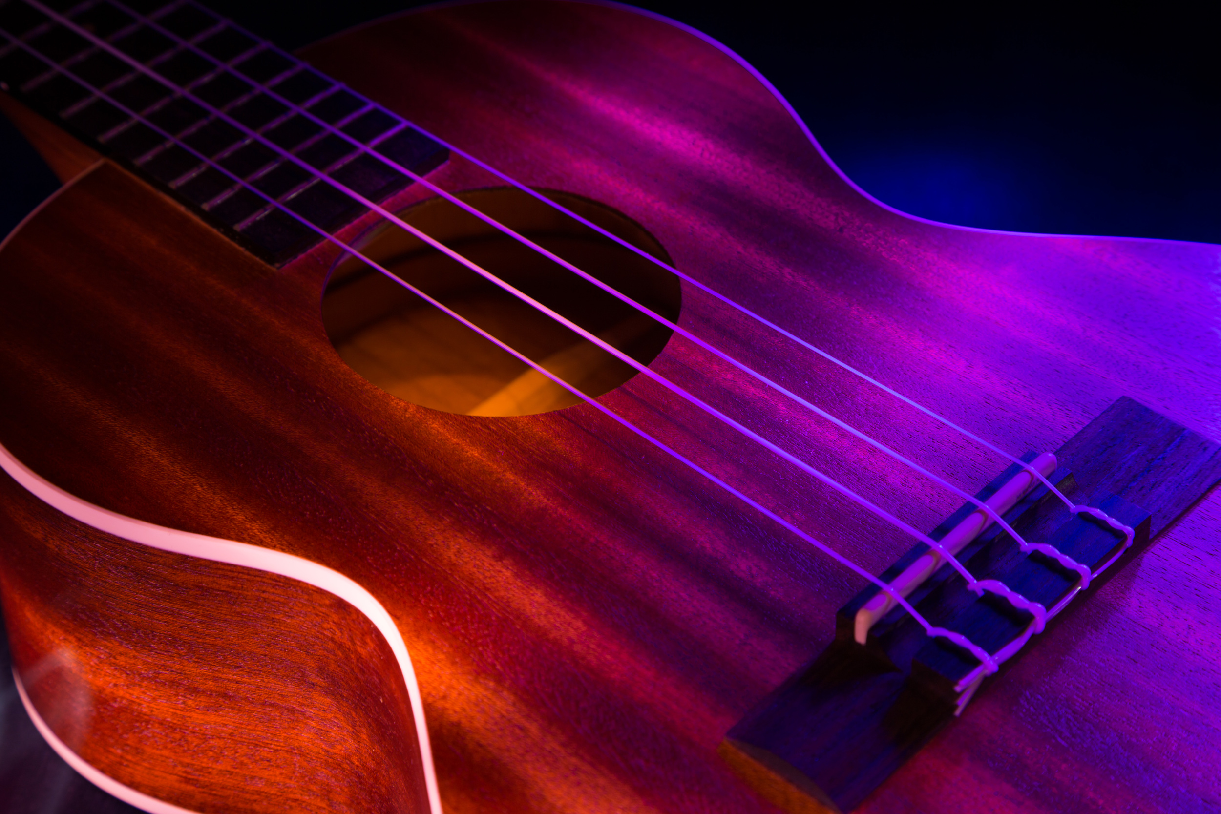 Light painting of a ukulele. I took a night to practice light painting in my apartment to try different color combinations and techniques. 