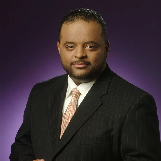 Mr. Roland Martin