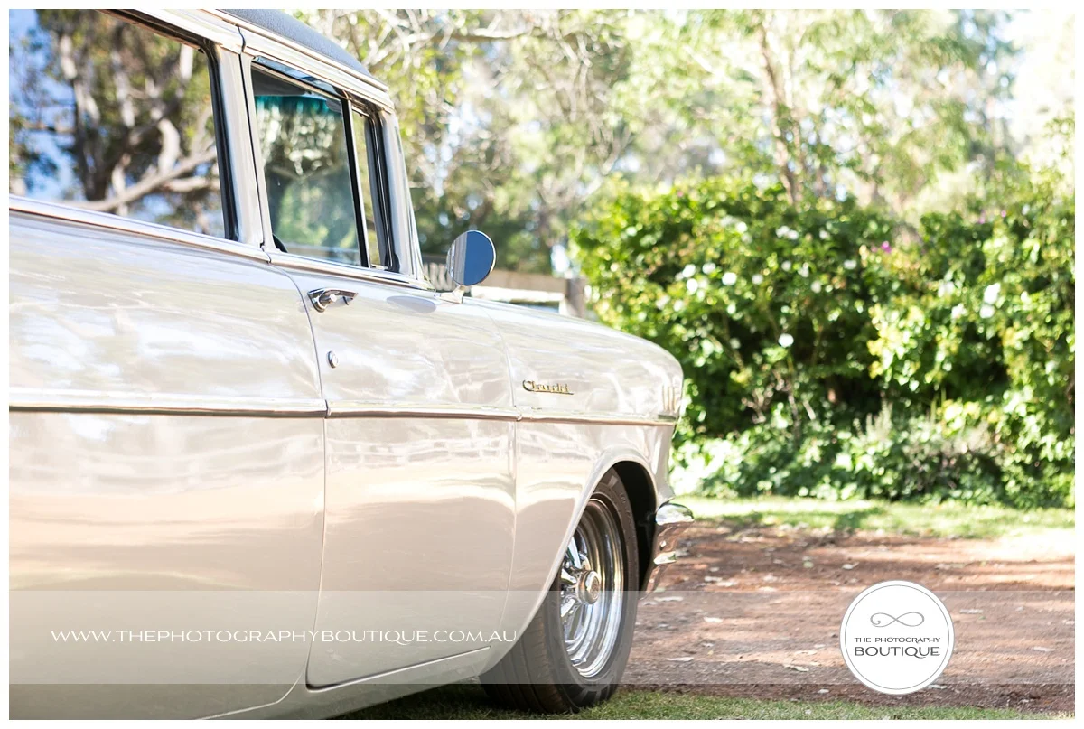 chevy limousine arriving at chandeliers on abbey wedding margaret river