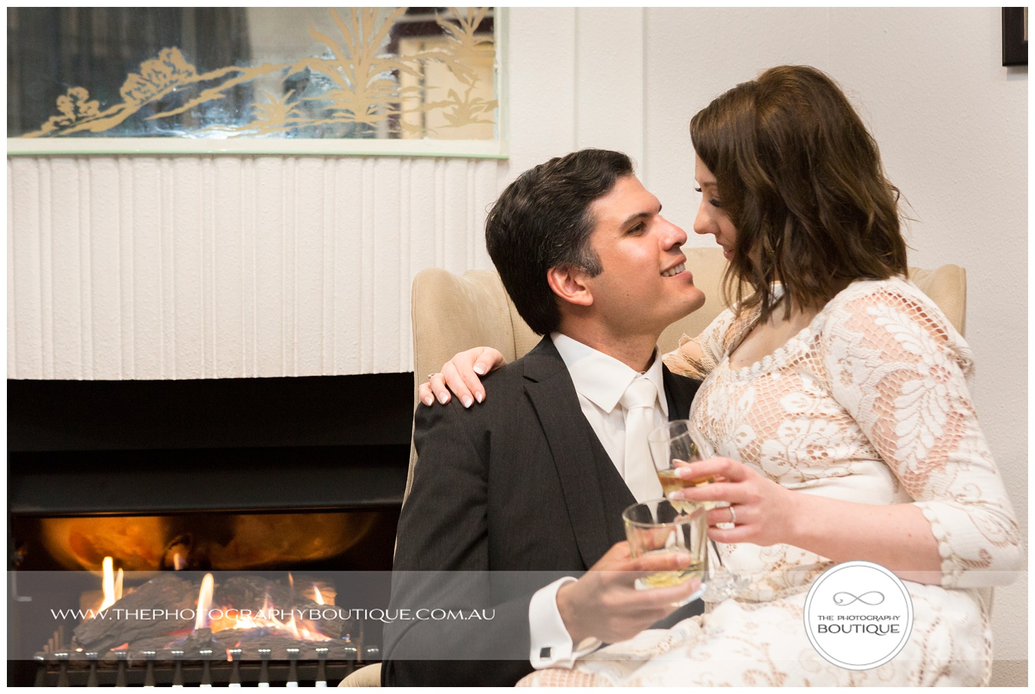 bride and groom toasting at Caves House Yallingup