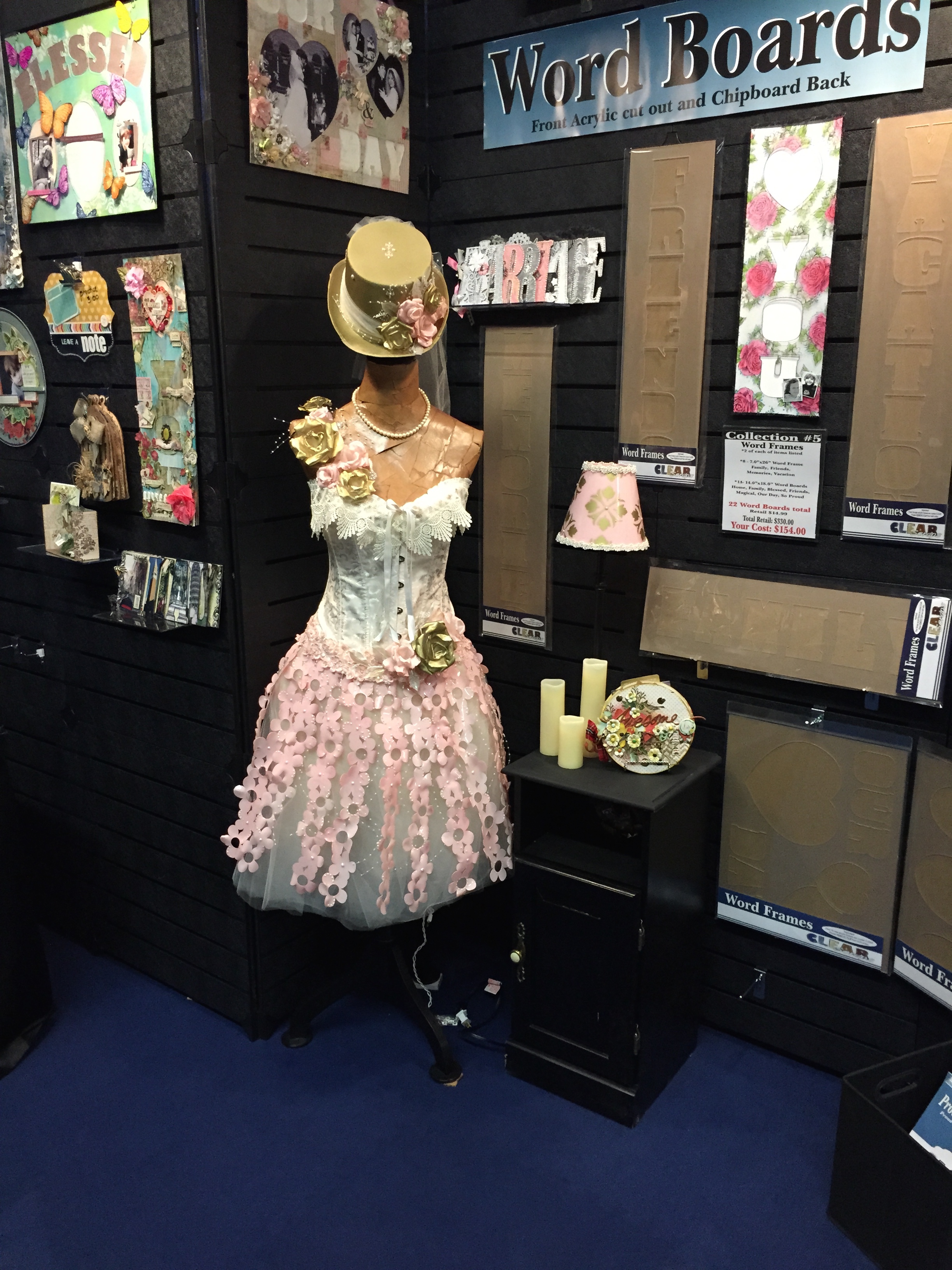 Here's more beautiful pieces from them. (You can actually find some of my OLD designs in the booth! They used to make word albums and STILL CAN but didn't have any samples so they asked if I could bring a couple. 