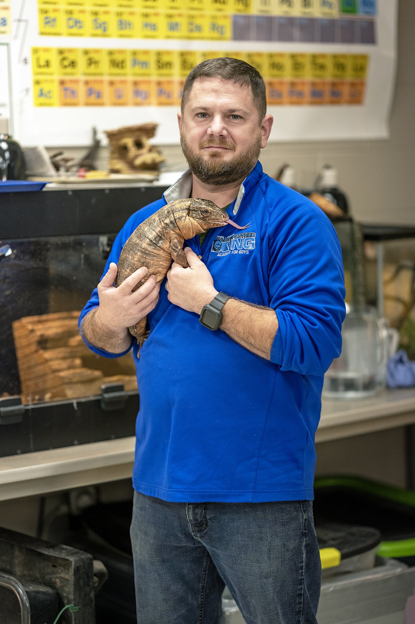 Luke McKinley, Science Teacher, with Mona the Red Tegu, MLK Jr. Academy, Toledo, Ohio