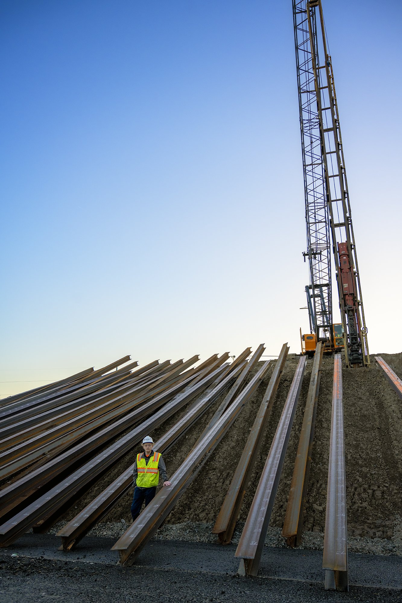 I-beams and pile driver before placement