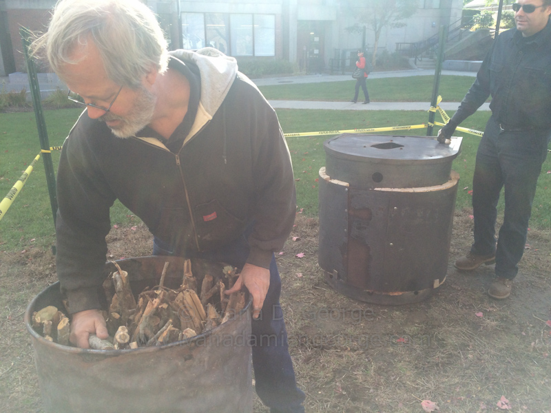 Bob Wells of New England Biochar demonstrates how to tightly pac
