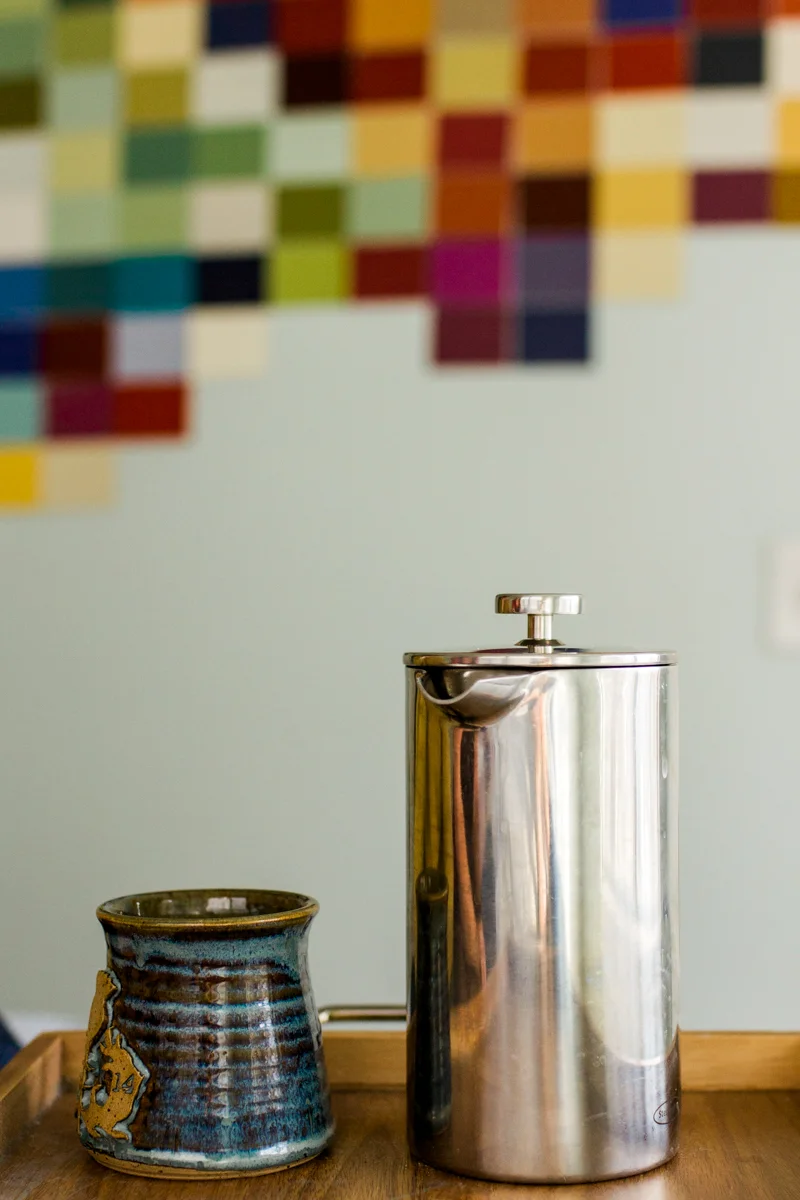 French press coffee and mug during an intimate in-home couples session in Kansas City, MO