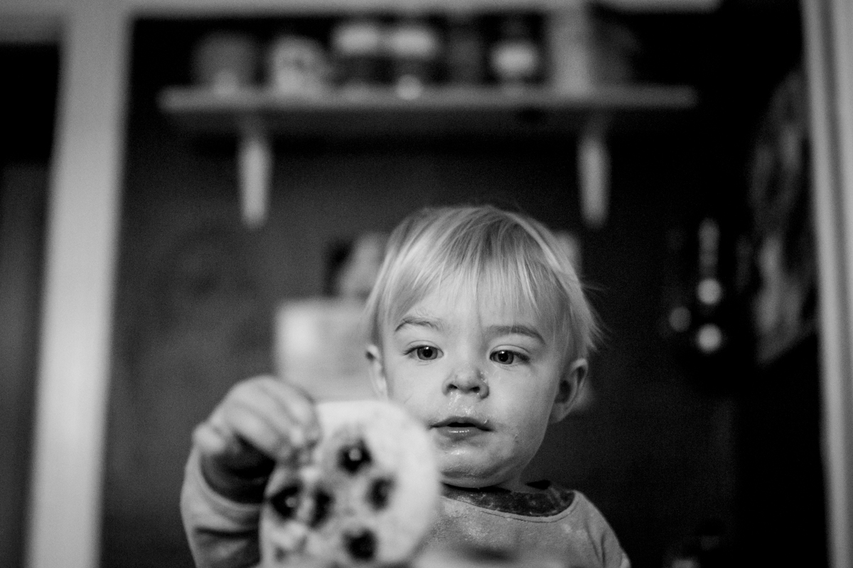  Kansas City, MO lifestyle family photographer boy with pancakes family photography black and white photography 