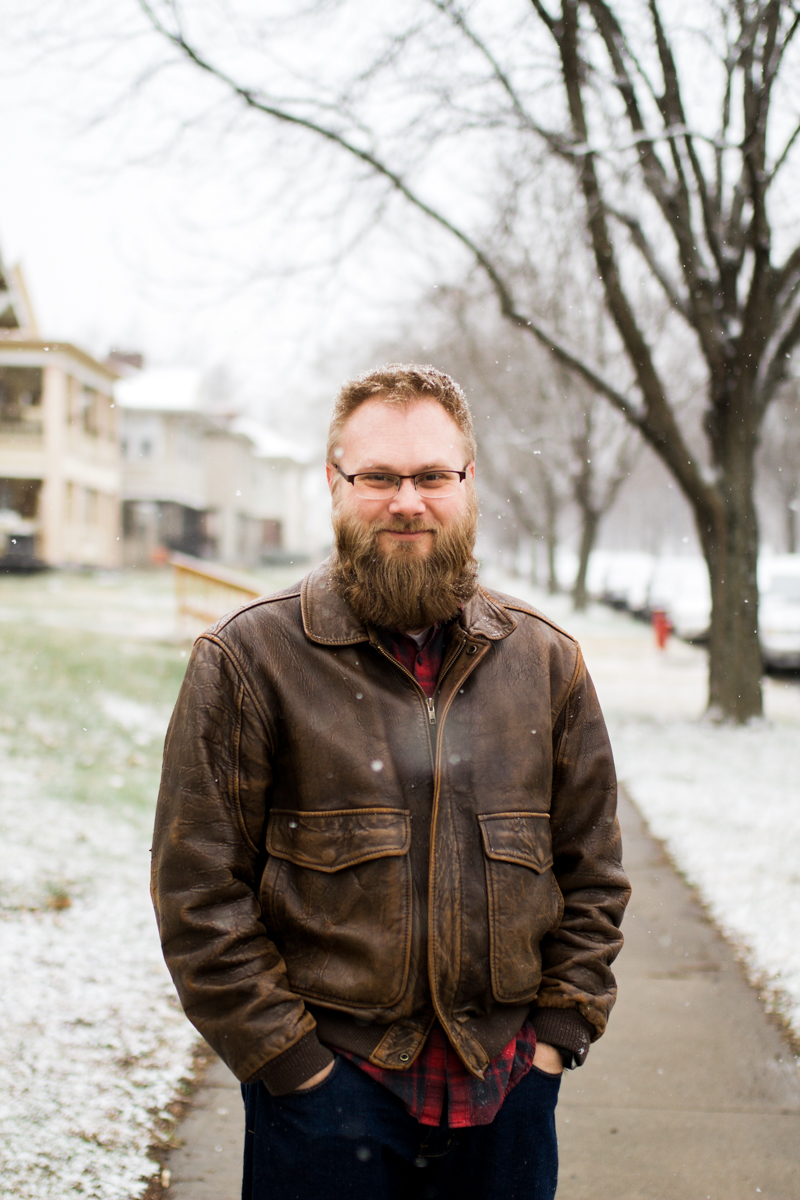  Kansas City, MO lifestyle family photographer bearded man in the snow winter family photography 