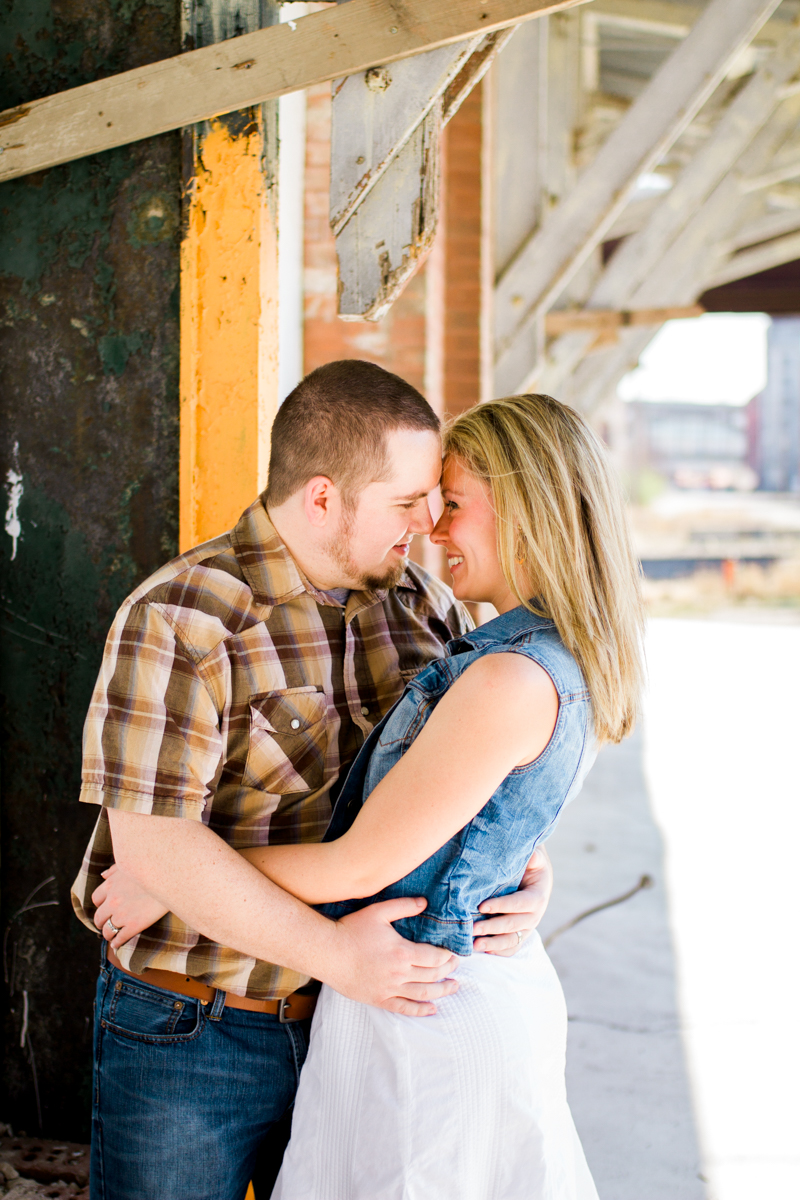  Couples session in Kansas City west bottoms couples photography couple under porch awning 