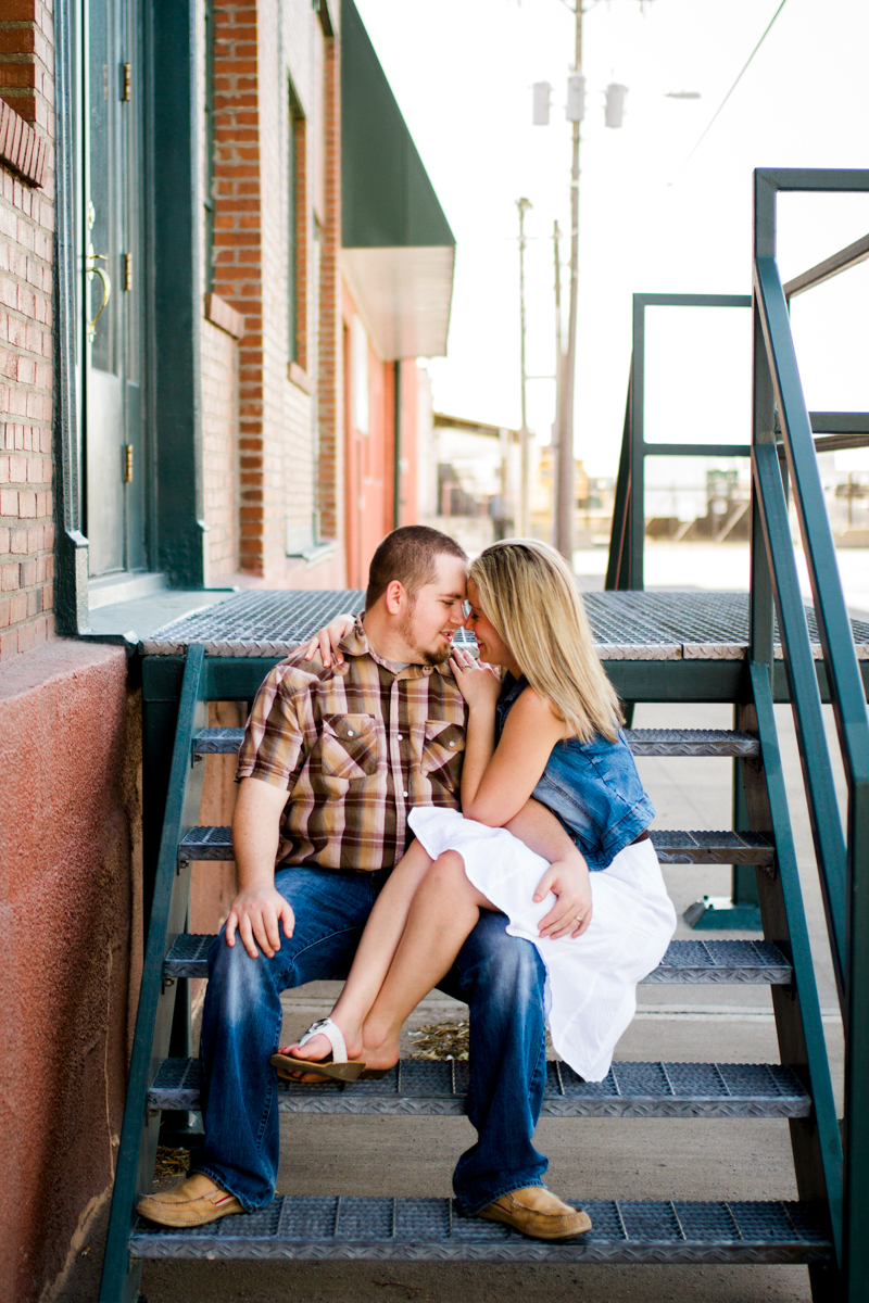  Couples session in Kansas City west bottoms couples photography couple sitting on stairs 