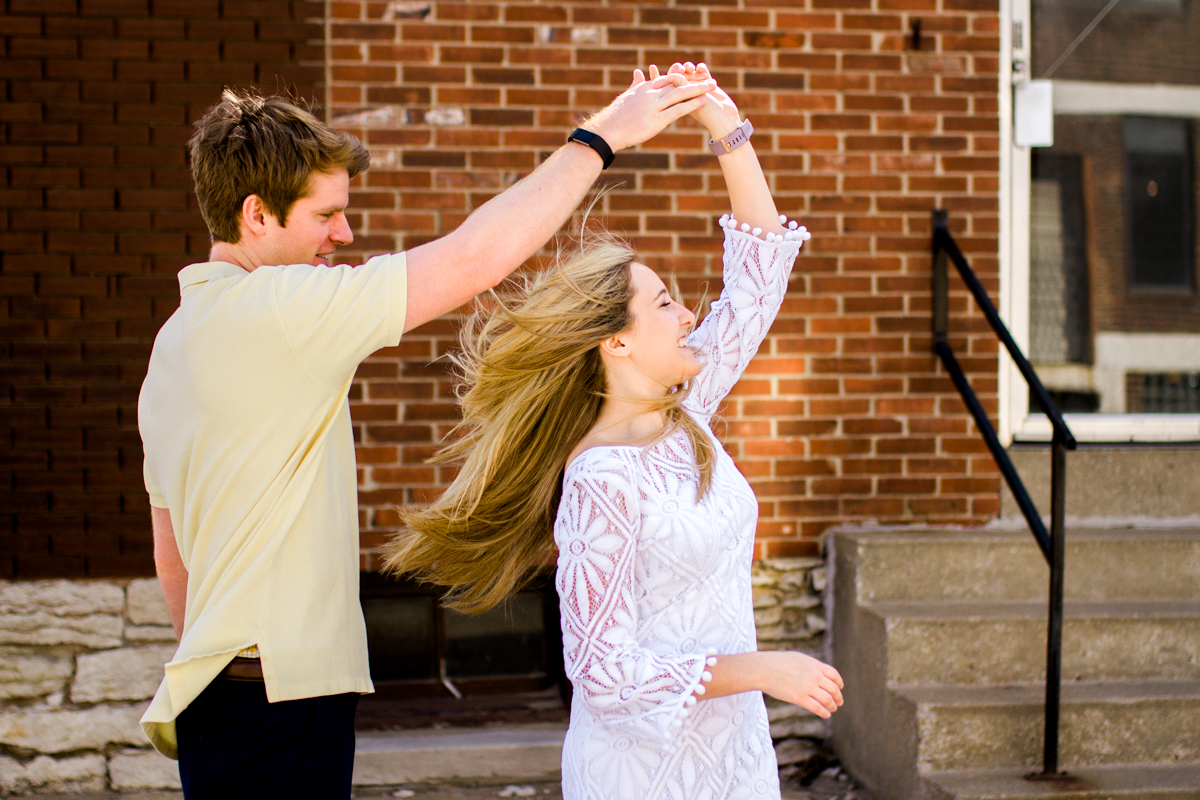 Engagment photos in Kansas City west bottoms couple dancing engagement photography